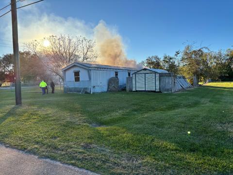 Sentinel photo/MaLinda Reddell Vacant trailer engulfed with flames Wednesday, Dec. 11