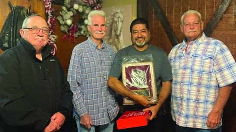 BCVFD Photo The Bay City Volunteer Fire Department held their annual awards ceremony and Christmas Party, Dec. 10. From left, Assistant Chief Bob Klepec, Chief Randy Fronz, Camilo Reyes- Firefighter of the Year for 2024, and Assistant Chief Mike Coppock.