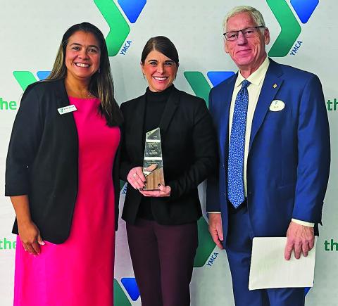 Courtesy photo Matagorda County Coastal & Marine Resources Extension Agent Amy Nowlin, center, was recognized as the Volunteer of the Year by the Calhoun County YMCA for her contributions to the YMCA Palacios Programs on Jan. 23. 