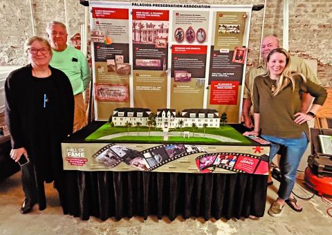 Courtesy photo The finished display is ready to be driven down to Rockport for the Smithsonian Crossroads exhibition. The Luther display team includes Robin Reynolds, Chuck Madeley and Stuart and Brandi Pitman.