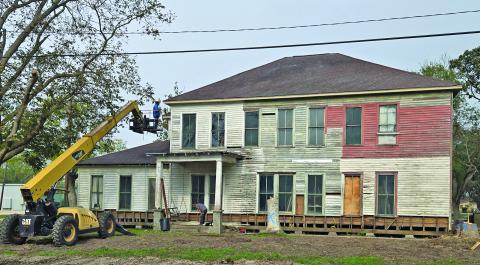 Above, work is on the way to restore the historic Markham-Fisher Hotel.  Sentinel Photo MaLinda Reddell