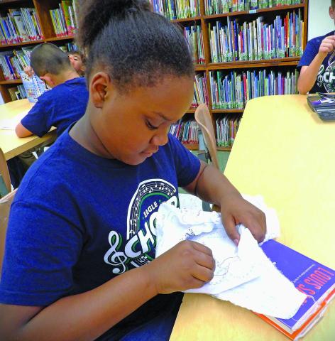 Photo courtesy of Holy Cross Catholic School Holy Cross Catholic School's 4th graders are busy working on their quilt project for this year's annual HCCS Spring Bazaar on April 27. 