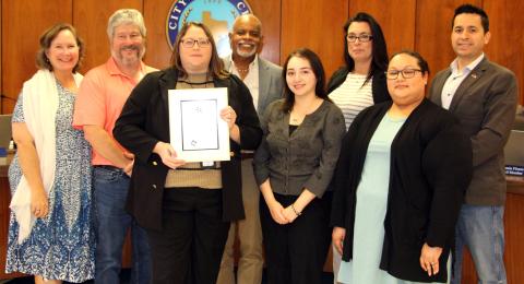 Sentinel Photo/Jessica Shepard City Council members join Bay City Public Library staff for a photo celebrating the library's "2024 Achievement of Library Excellence" award from the Texas Municipal Library Directors Association at the council's regular meeting on Tuesday, March 25. 