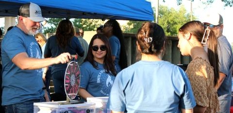 Sentinel Photo/Jessica Shepard The Crisis Center held its “5th Annual Light up the Square” at the Matagorda County Courthouse last Thursday. The event featured food trucks, sexual assault and child abuse awareness information booths, children's activities, and luminaries for remembering county victims of abuse.