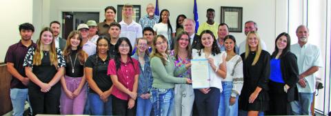 Sentinel Photo/Mike Reddell Commissioners Court proclaimed April 21-25 as National Student Leadership Week for the Youth Leadership Matagorda County Program participants, shown above with Commissioners Court members and sponsor James Outtrim, with HIF USA  Matagorda County.