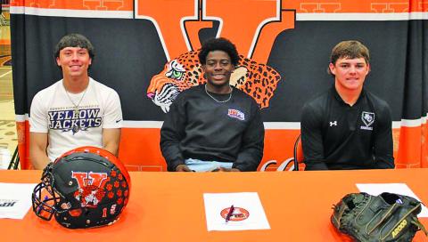 Van Vleck ISD photo Van Vleck High School recently had three Leopard student-athletes sign their college papers to play at the next level. The three were, from left: Logan Carter (Howard Payne Football); Corey Austin (UTPB Football), and Wade Hutson (Ranger College Baseball). 