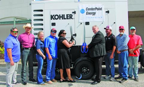 Sentinel Photo/Mike Reddell Matagorda County Commissioners Court, Emergency Management and CenterPoint Energy representatives held a ribbon cutting last for the generator donation.