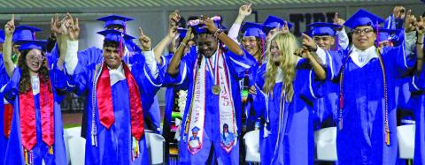 Sentinel Photo/Jessica Shepard Tidehaven High School graduates celebrates at last week’s commencement ceremonies.