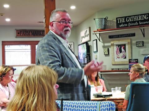 Sentinel Photo/Jessica Shepard Matagorda County Economic Development Corporation (MCEDC) Executive Director Mike Ferdinand discussed several project updates with a full crowd at Cassady’s Coffee Bar & Café in Matagorda on May 30. 