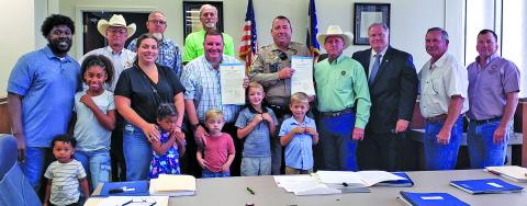 Sentinel Photo/Jessica Shepard Commissioners recognized Matagorda County Sheriff’s Office Sergeant Jeremy Nash and Deputy Matthew Martin for their life saving efforts on a Van Vleck woman in May on Monday, July 7.