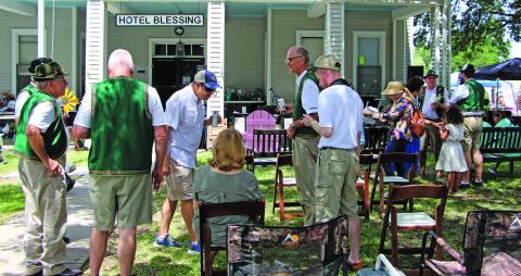 Sentinel Photo/Jessica Shepard Below, the crowd assembled for the much-anticipated auction that benefits the hotel. 