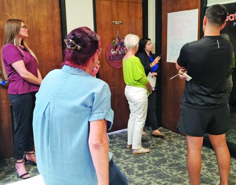 Sentinel Photo/Jessica Shepard Main Street Manager Tina Israel leads members of the Main Street board in a strategic planning workshop. They focused on aligning Main Street’s goals with the city’s strategic plan.