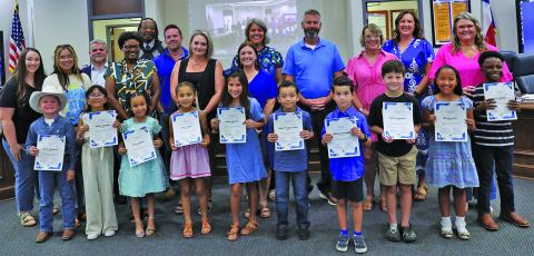 BCISD photo Linnie Roberts students, who earned top performance honors in both math and reading, were recognized by the Bay City ISD at a recent school board meeting.