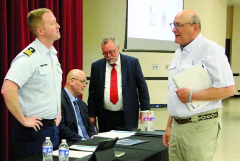 Sentinel Photos/Jessica Shepard At left, US Coast Guard Commander Jake Lobb and Maritime Administration Transportation Industry Analyst Brian Barton led the comment session on the ST LNG deepwater port project last week. Local commenters included Port of Bay City Authority Chairman George Harrison, front right, and Matagorda County Economic Development Executive Director Mike Ferdinand, back right.