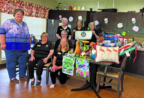 Contributed photo Pilot Club of Bay City members show off the items donated to Colonial Living and Rehabilitation Center Memory Unit.