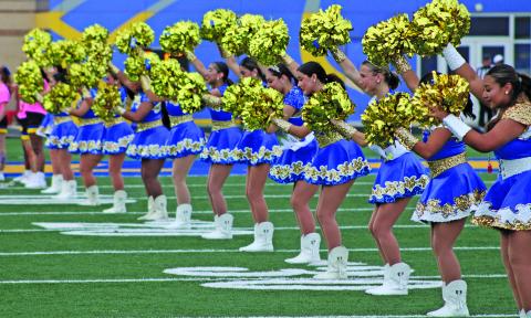 Sentinel Photo/Mike Reddell Bay City High School Aristocats line up for the entrance of the 2025 Blackcats at Memorial Stadium Friday night. Bay City eclipsed the Sweeny Bulldogs 48-14 to start the season. The Blackcats travel to Edna this Friday.