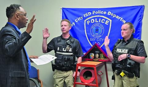 BCISD photo The Bay City ISD Police Department held a small ceremony to swear in two new police officers on Tuesday, Sept. 2. The ceremony was at the Bay City ISD Police Department with Chief L.C. Cunningham, Jr. swearing in Officer Anthony Rabun and Officer Heather Lewis to the Department.