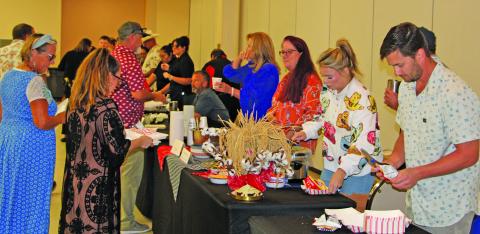Sentinel photo/Jessica Shepard Gourmet Guys, the main fundraiser for the Matagorda County Museum, attracted an impressive turnout Saturday, Sept. 27. This year’s theme was “50 Nifty United States” and the cooking teams delivered a lively diversity of dishes.
