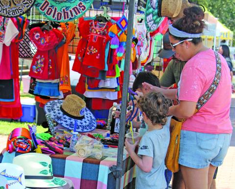 Sentinel Photo/Jessica Shepard Market Day vendors were out in force, providing an assortment of wares for customers on Saturday, Sept. 27. The beautiful weather highlighted everything from food and drink to toys, knives, and non-profit booths. 