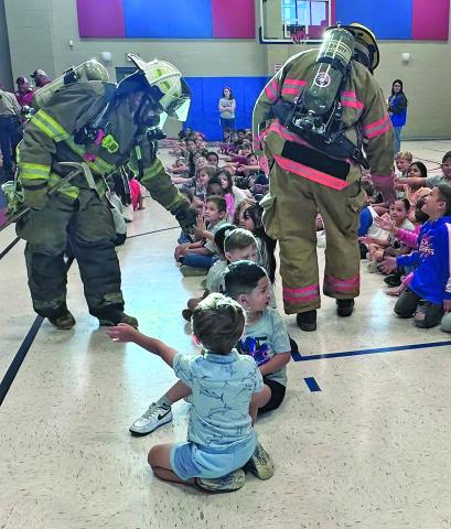 Courtesy photo Markham Volunteer Fire Department came to Markham Elementary School to teach students about fire safety during Fire Prevention Week.