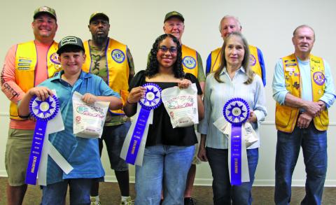 Sentinel Photo/Mike Reddell 2025 Rice Dish Roundup Grand Champion winners were chosen from each respective age division on Tuesday, Oct. 14. From left are Robert Porter, Nevaeh Mangum, and B. Trevino. Not pictured is Cora Romine. 