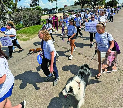 Courtesy photo The Crisis Center expressed gratitude to everyone who took part in last week’s  Walk a Mile in Their Shoes in Bay City. Crisis Center officials said those in the walk helped remind survivors that they are not alone and that our community stands united against domestic violence. 