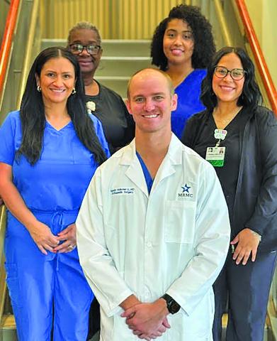 Contributed photo Dr. Randy Volkmer II and his staff at Medical Group clinic.