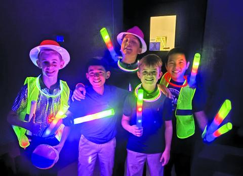 Holy Cross Catholic School 5th Grade boys- Bowen Tomek, Kavi Howard, Casen Saha, Erin Lin, and Julian Lopez had a blast celebrating the groovy 70s at the blackout dance party!  Holy Cross Catholic School Photo