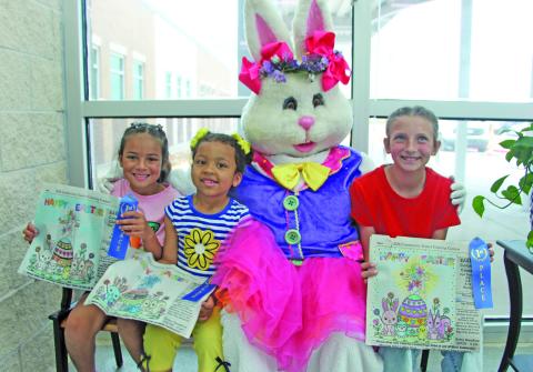 Sentinel Photo/Jessica Shepard This year's Bay City Sentinel Easter Coloring Contest winners are, from left, Maggie Dean, Aubree Johnson, and Emma Kubecka. Each winner received a blue ribbon for their artistry and an Easter basket full of treats.