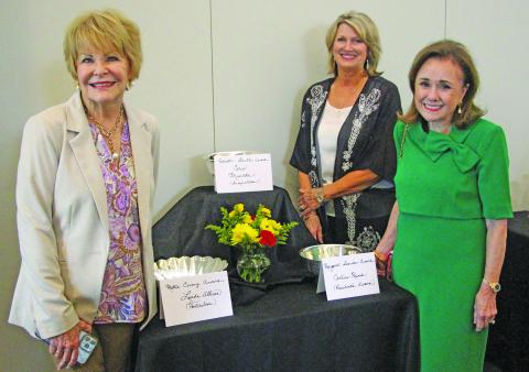 Sentinel Photo/Jessica Shepard Winners of the Garden Club Floral Show's "Celestial Garden" competition were recognized at the show's presentation evening event on April 16. Those winners, from left, are Linda Allison, Carlisa Krenek, and Cerie Muecke. Show winners were chosen based on their horticulture specimens and several unique floral arrangement designs.