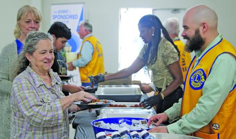 Sentinel Photo/Mike Reddell Bay City Lions Club members did their part to make sure people who attended the club’s pancake supper March 26 at the KC Hall had a plate full of pancakes, sausage, and bacon. 