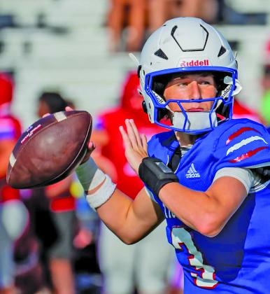 Migasproductions Tidehaven’s quarterback takes aim downfield in the Tigers scrimmage with Columbia last week.