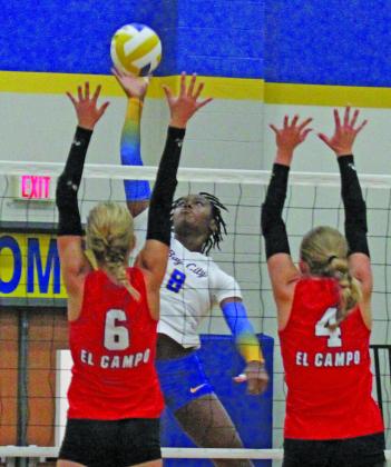 Photo by Anna Hernandez Bay City’s Sasha Onwuchekwa (8) goes up for a powerful spike during Friday night's 3-2 loss to El Campo. Bay City, 14-13, and third in district standings, was to play Stafford Tuesday night, Sept. 29.