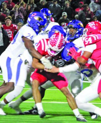 Sentinel Photo/Mike Reddell Blackcats converge on El Campo running for no yardage.