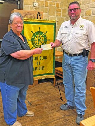 Pilot Club of Bay City President Barbara Smith presented Precinct 6 Constable Bill Orton, a check for boating safety signs at a recent Pilot Club meeting. This donation covers the signs and installation, providing safety guidelines for boaters at all Sargent area boat ramps. We encourage all boaters to take a picture of the sign so they have the information on hand if needed. This project was funded by the Pilot Club Celebrity Waiter Dinner Fundraiser, which will be held on Thursday, Oct. 15. Courtesy photo