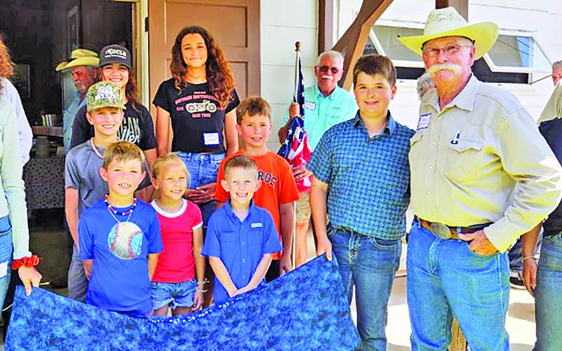 Quilt of Valor photo courtesy of Danyelle Merck The Quilt of Valor was presented to Vietnam Veteran Jack Cornett, by the youth of Collegeport and the El Maton 4-H.