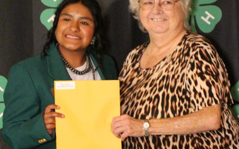 Sentinel Photo/Jessica Shepard Kathy Jackson, right, was recognized for 55 years of service as a 4-H Adult Leader at the "2026 4-H Annual Awards Banquet" July 16. Other adult leaders honored for their years of service include Dane Kubecka, Kristen Kubecka, Amanda Saha, John Gilbert, Katie Gilbert, and Nancy Johnson.