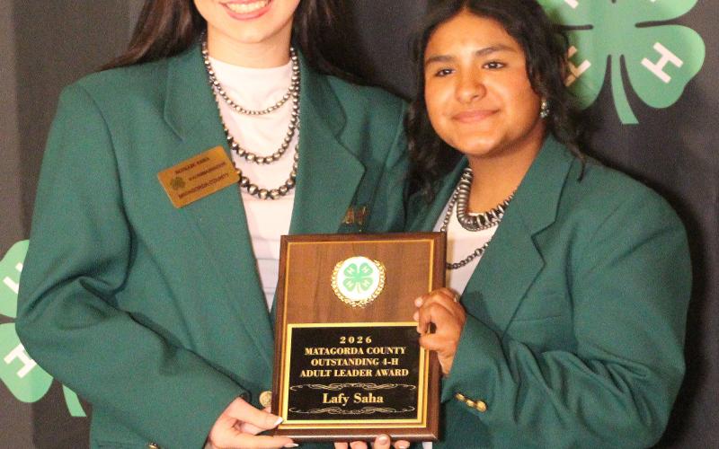 Sentinel Photo/Jessica Shepard :Matagorda County 4-H Ambassador Secretary Scollie Saha, left, accepted the "Outstanding Adult Leader Award" on behalf of her mother Dr. Lafy Saha, DVM at the "2026 4-H Annual Awards Banquet" July 16.