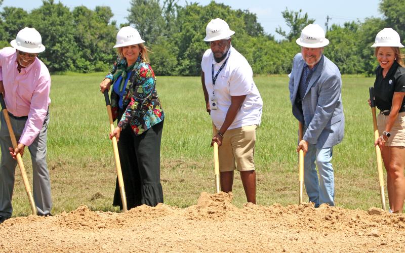 Sentinel Photo/Jessica Shepard  Mayor Robert Nelson, City Manager Scotty Jones, City Councilman Cory McCray, City Councilman Jim Folse, and City Councilwoman Susan Reardon also participated in the celebration as part of the city's partnership interest in the aquatics center.