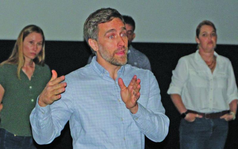 Linea Energy Senior Developer Chris Barry, center, explains the construction process for the company's solar project during a sponsored luncheon on Monday, June 29. The solar project will be located on about 2,330 acres in Buckeye. Sentinel Photo/Jessica Shepard