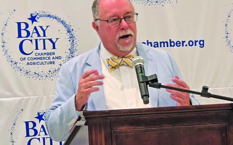 Sentinel Photo/Jessica Shepard Matagorda County Economic Development Corporation (MCEDC) Executive Director Mike Ferdinand spoke to more than 100 business professionals last week at Bay City Chamber of Commercee &amp; Agriculture luncheon.