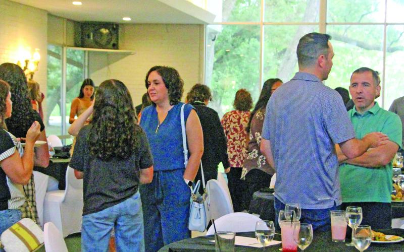 Sentinel Photo/Jessica Shepard Members of the Youth Leadership Matagorda County mingle with school and business leaders during a luncheon last week.