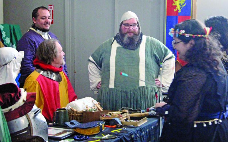Sentinel Photo/Jessica Shepard Participants in the Art League of Bay City's “Mystic Realms ArtWalk 2026” show off distinctive costumes reflecting a lost world of magic Aug. 15.