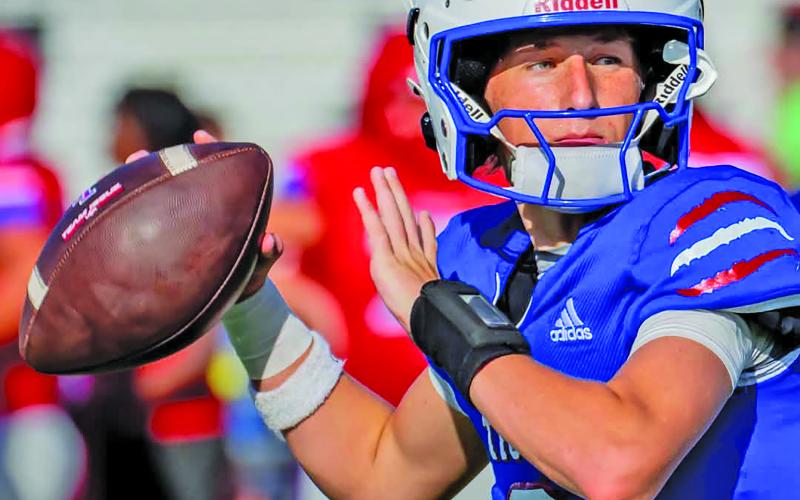 Migasproductions Tidehaven’s quarterback takes aim downfield in the Tigers scrimmage with Columbia last week.