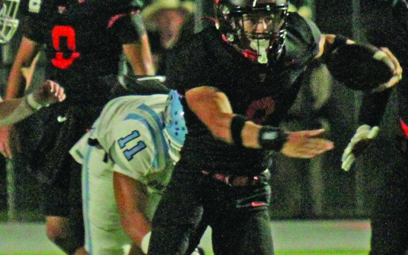Anna Hernandez photo Van Vleck’s Jabob Schneider (9) cuts through the Sweeny defense and finds a hole and makes some much needed yards.