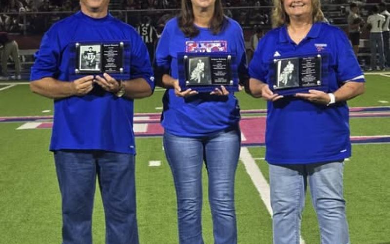Tidehaven ISD photo  Three Tidehaven Athletic Hall of Fame inductees: Robert Dannels, Bridgette McKissick Dannels, and Stacy Pierce Wolf,  were honored at halftime of the Tidehaven-Ganado football game Friday, Aug. 28. Before the game, the inductees gathered with their families and friends for a small reception. At halftime, our inductees were proudly presented to the Tidehaven community and honored with plaques that will hang in the Dome.