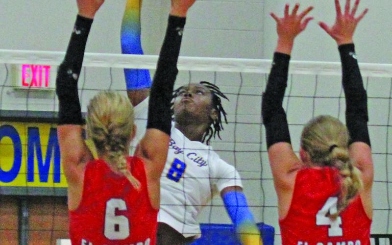 Photo by Anna Hernandez Bay City’s Sasha Onwuchekwa (8) goes up for a powerful spike during Friday night's 3-2 loss to El Campo. Bay City, 14-13, and third in district standings, was to play Stafford Tuesday night, Sept. 29.