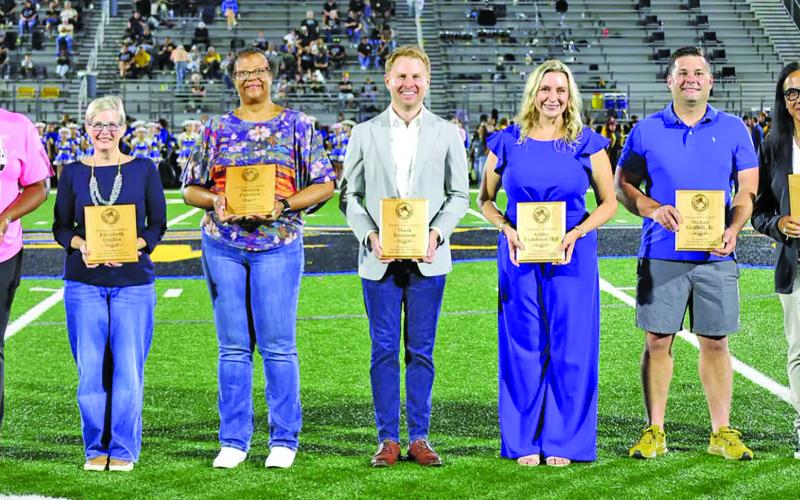 Courtesy photo Bay City ISD celebrated its 2026 Distinguished Alumni Class during a Blackcat football halftime Friday, Oct. 9. This year’s Distinguished Alumni honorees: Michael Griffith, Jr., Ashley Frankson Hill, Mark Isaacson, Elizabeth Quillin, Ray Garcia, Valerie Johnson - not pictured, Monica Pointer, Shaun Rutherford - Kearston Hines and Shaun’s Goddaughters received his award.