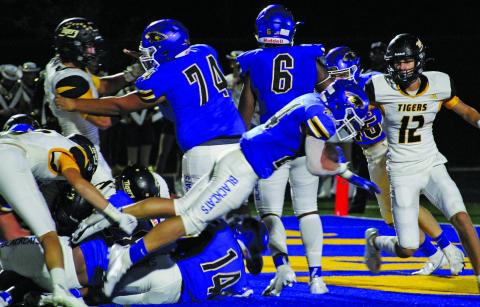 Sentinel photo/Mike Reddell Blackcat junior running back Ayden Smith (24) makes a successful lunge for a second-quarter touchdown. He scored both of Bay City’s touchdowns, the second from a fourth-quarter, 42-yard pass play from quarterback Joel Davalos.