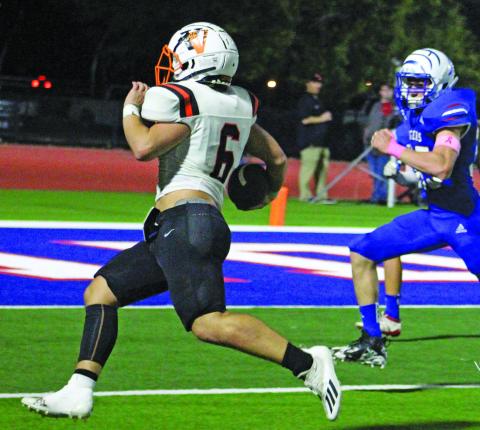 Sentinel photo/Jessica Shepard Van Vleck sophomore back Brett Noster (6) speeds into the end zone on one of his two touchdowns against Tidehaven last Friday. 